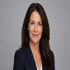 Portrait of Rebecca Hart, regulatory review editor in navy blazer