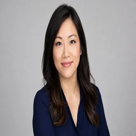 Portrait of Michelle Chen, neutrality reviewer in light blue shirt